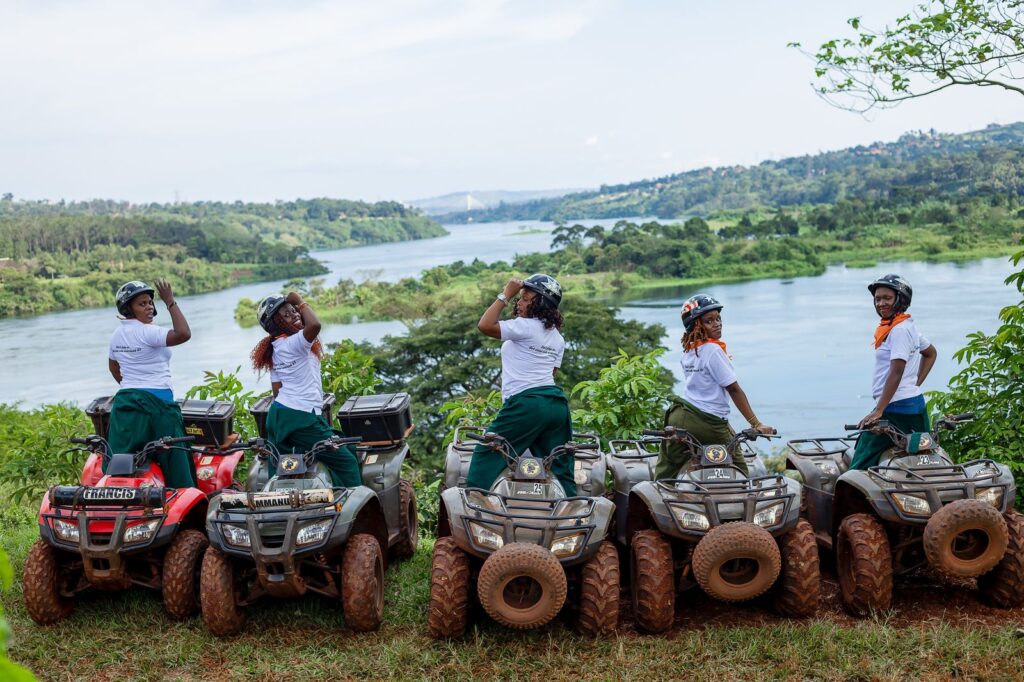 Quad bikers stopping at a viewpoint over the Nile near Jinja