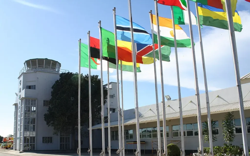 Flags in front of the terminal at Entebbe International Airport