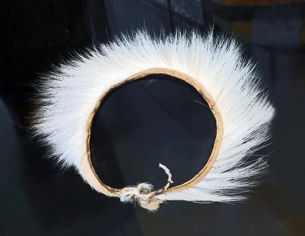 Intore dancer's headdress of white fibre in a museum collection
