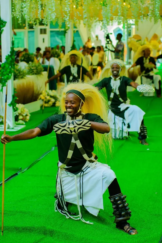 Intore dancer in a headdress and costume performing in Rwanda