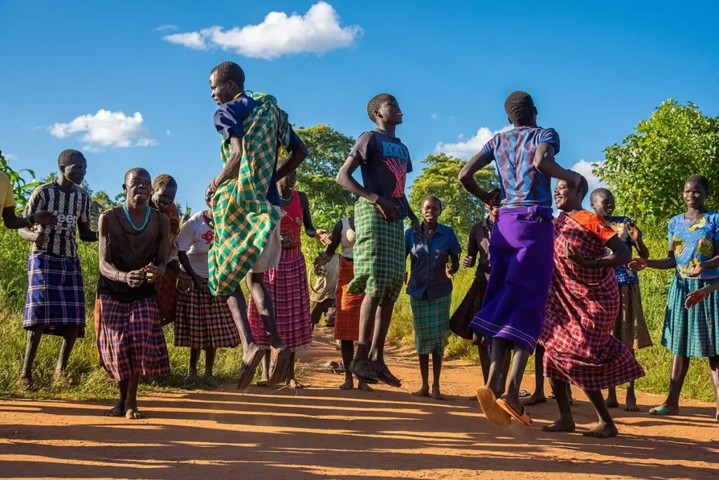 Karamojong dancers performing a traditional jumping dance